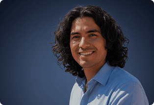 Man with long dark curly hair